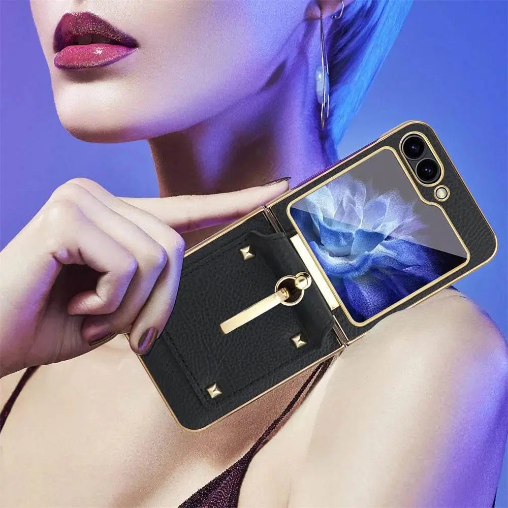 Close-up of woman holding elegant leather and gold foldable smartphone with flower image on screen