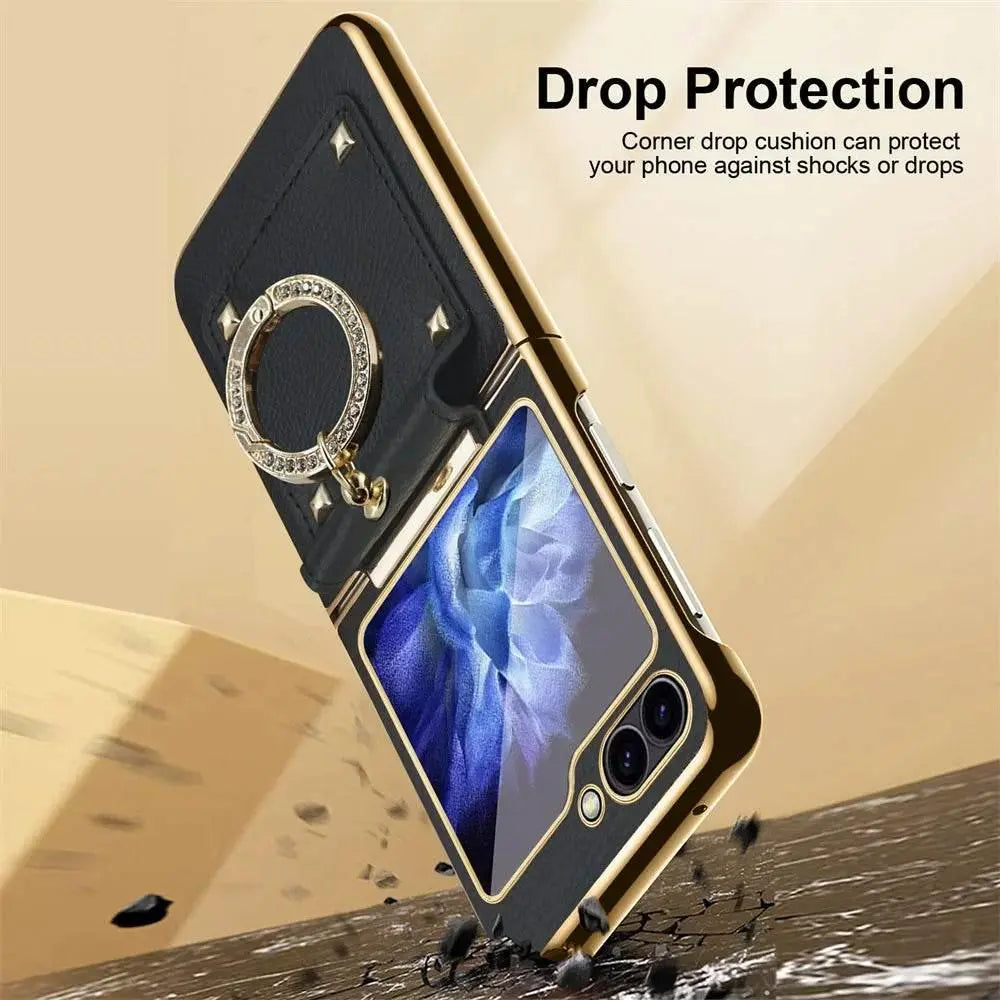 Black and gold foldable phone case with ring holder, drop protection, shown on cracked surface